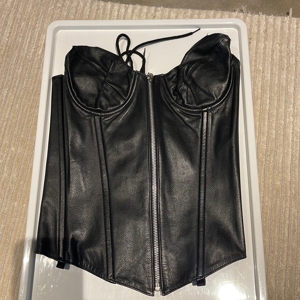 Black leather corset thrifted in LA vintage